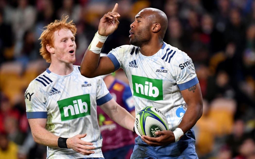 Mark Telea (right) of the Blues celebrates scoring a try with Finlay Christie during the Round 4 Trans-Tasman Super Rugby match against the Queensland Reds at Suncorp Stadium in Brisbane, Friday, June 4, 2021.