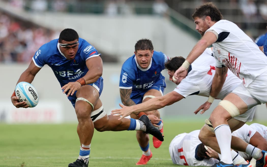 HIGASHIOSAKA, JAPAN - SEPTEMBER 21: Iakopo Petelo of Samoa runs with the ball to score the team's first try during the World Rugby Pacific Nations Cup 3rd Place Play-Off between United States and Samoa at Hanazono Rugby Stadium on September 21, 2024 in Higashiosaka, Osaka, Japan. (Photo by Paul Miller/Getty Images)