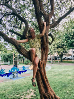 Kate in an ancient feijoa in Square Mistral in Cannes, France.