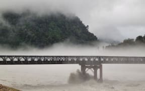 The Waiho Bridge levels are dropping following severe heavy rain in the Westland are on 19 January 2024. Picture taken morning on 20 January 2024.