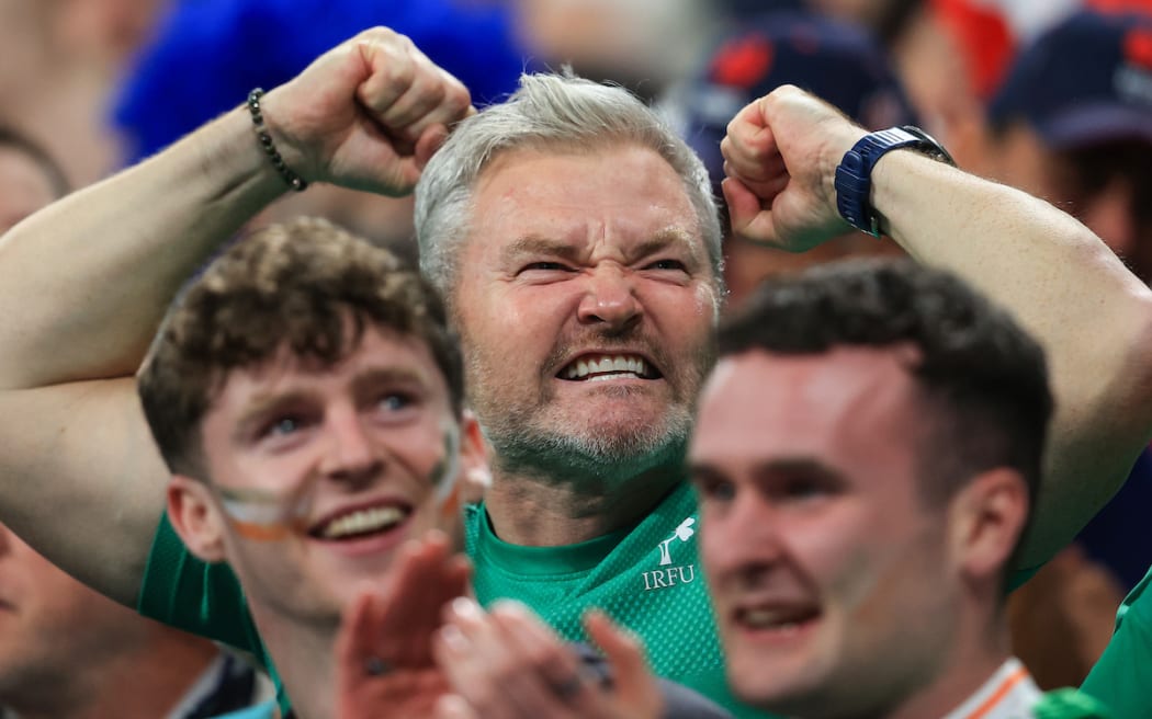 Ireland fans celebrate after Bundee Aki scores