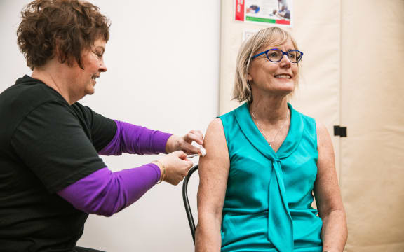 Immunisation Advisory Centre (IMAC) Director, Nikki Turner receiving her COVID-19 vaccination