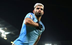 Sergio Aguero celebrates scoring against Liverpool