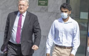 Yuvaraj Krishnan leaves Manukau District court after pleading guilty to using a forged document to get an advantage.
