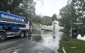 Kimberley Road, Epsom. Lots of cars have been caught in floodwaters and are waiting to be towed. 28 January, 2023