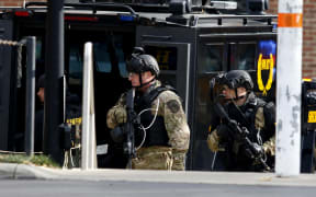 Officers respond to an attack at the Ohio State University that left eight people injured.