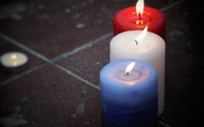 Candles at a vigil in Aotea Square, Auckland.