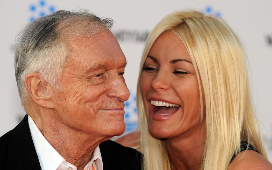 Playboy magazine founder Hugh Hefner arrives with his fiancee  Crystal Harris at the TCM Classic film Festival opening night and World premiere of the newly restored "An american in Paris" on April 28, 2011 in Hollywood, California AFP PHOTO / GABRIEL BOUYS (Photo by GABRIEL BOUYS / AFP)