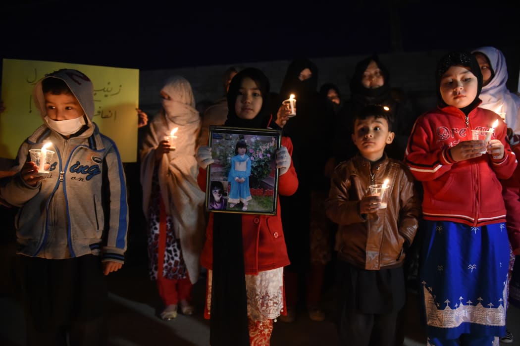 Pakistani members of the Hazara community hold a vigil in tribute to Zainab.
