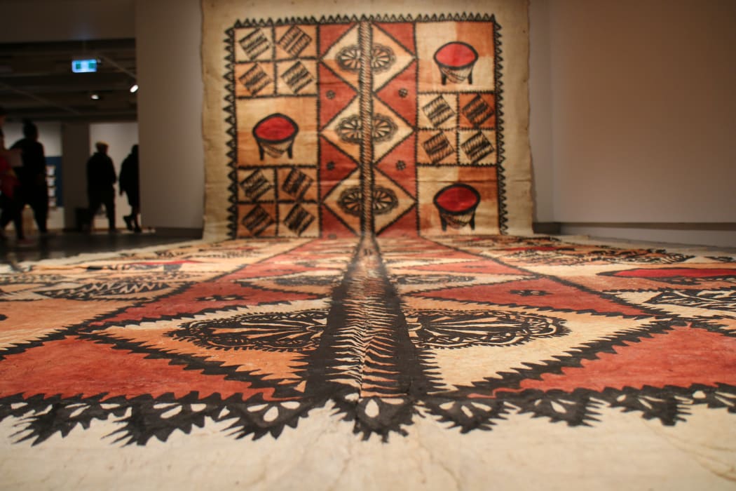 A majestic example Tongan ngatu dedicated by one of the matriarchs of the Akomai Heritage Group to her sons' love of Kava drinking.