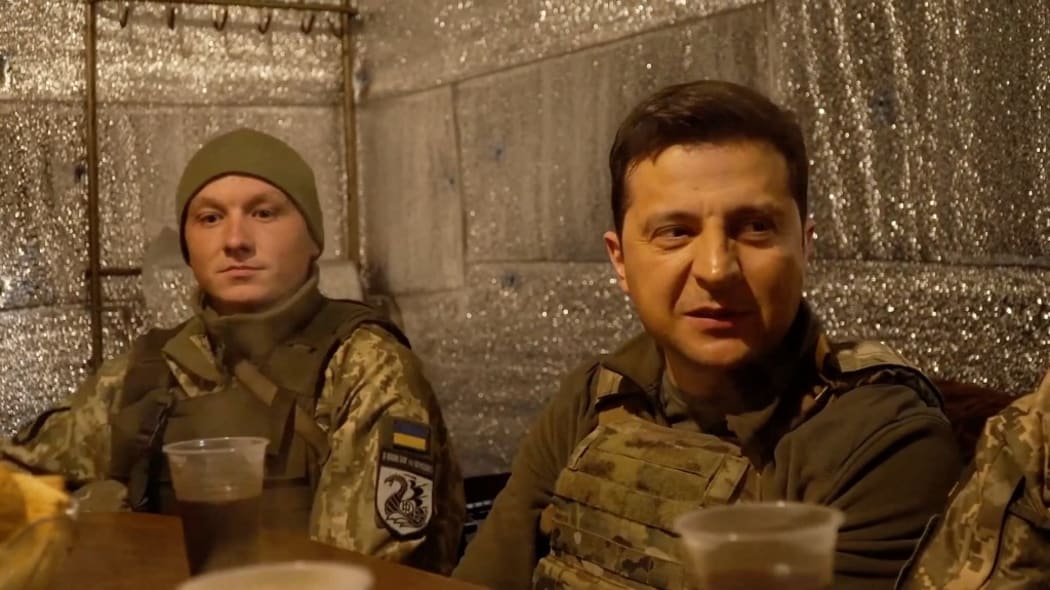 Ukrainian President Volodymyr Zelenskiy has dinner with soldiers in the frontline of Donbas, a conflict area with the Russian-backed separatists, during his visit to the Donetsk region in the east of Ukraine on Thursday February 17, 2022.