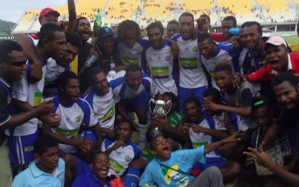 Lae City Dwellers celebrate back to back PNG National Soccer League titles.