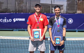 The Pacific Mini Games gold medalist Colin Sinclair of the CNMI (L)