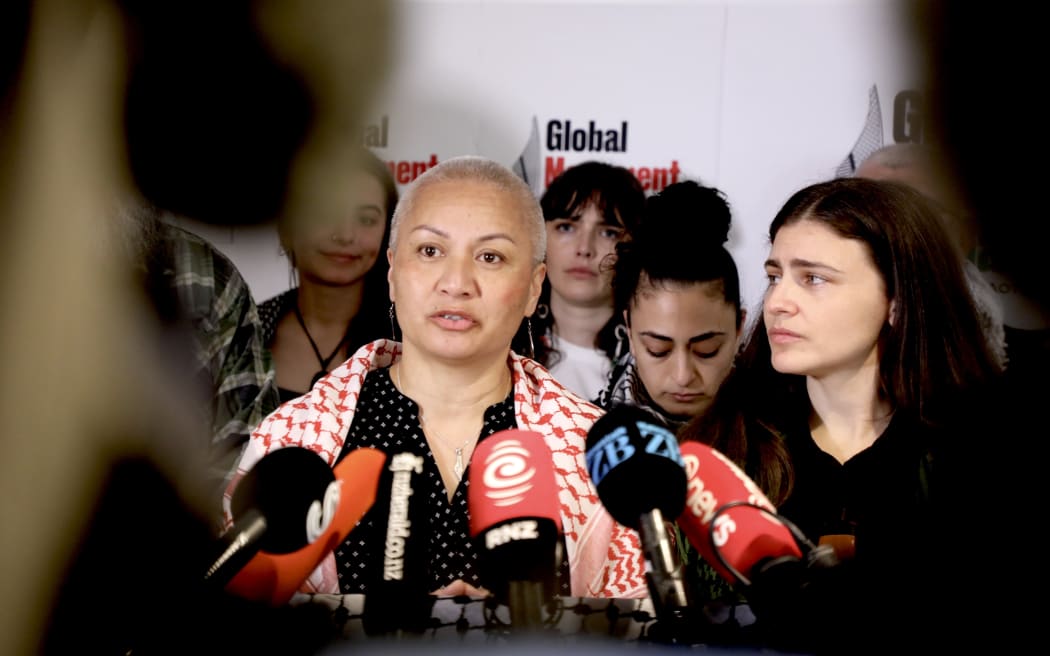 Green Party co-leaders Chlöe Swarbrick and Marama Davidson hold a media stand-up alongside family members of the New Zealanders aboard the flotilla.