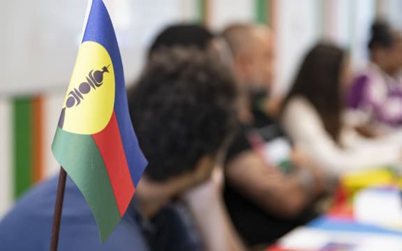 The independence flag at the FLNKS press conference in Noumea.
New Caledonia, Noumea, August 13, 2025. Photography by Delphine Mayeur / Hans Lucas.
Le drapeau independantiste lors de la conference de presse du FLNKS a Noumea.
Nouvelle-Caledonie, Noumea, 13 aout 2025. Photographie par Delphine Mayeur / Hans Lucas. (Photo by Delphine Mayeur / Hans Lucas via AFP)