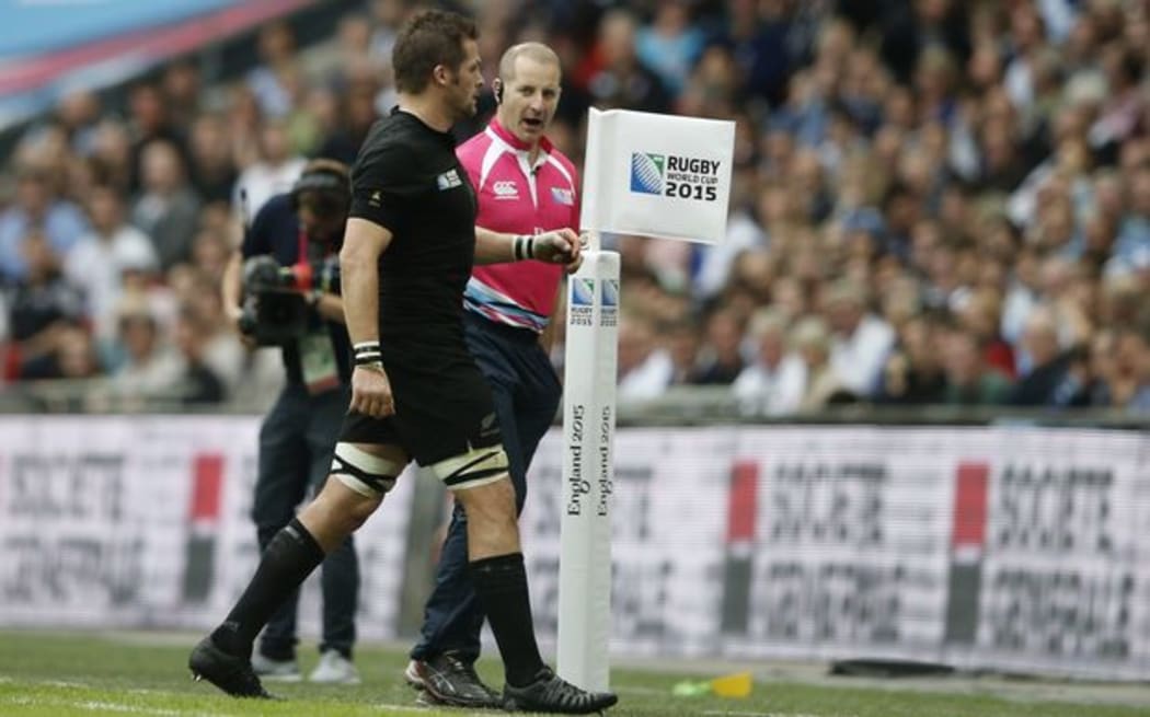 Richie McCaw does the walk of shame to the sideline.