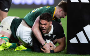 Quinn Tupaea celebrates scoring his try against the Springboks.