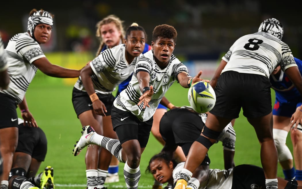 A photo of Lavena Cavuru of Fiji throwing the ball during a match against France at the Women’s Rugby World Cup 2021 (played in 2022). It was a pool match at Northland Events Centre, Whangarei, New Zealand on Saturday 22 October 2022.