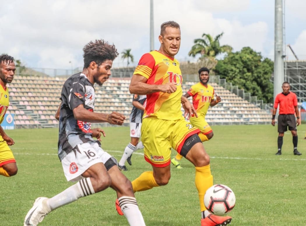 Lae City defender Alwin Komolong in action during the PNG National Soccer League.