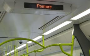 te reo  train - pomare sign on board