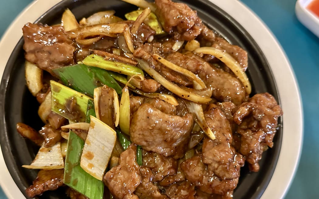 Black pepper beef, seared and clay-baked to sizzling perfection, Cantonese-style in Auckland.