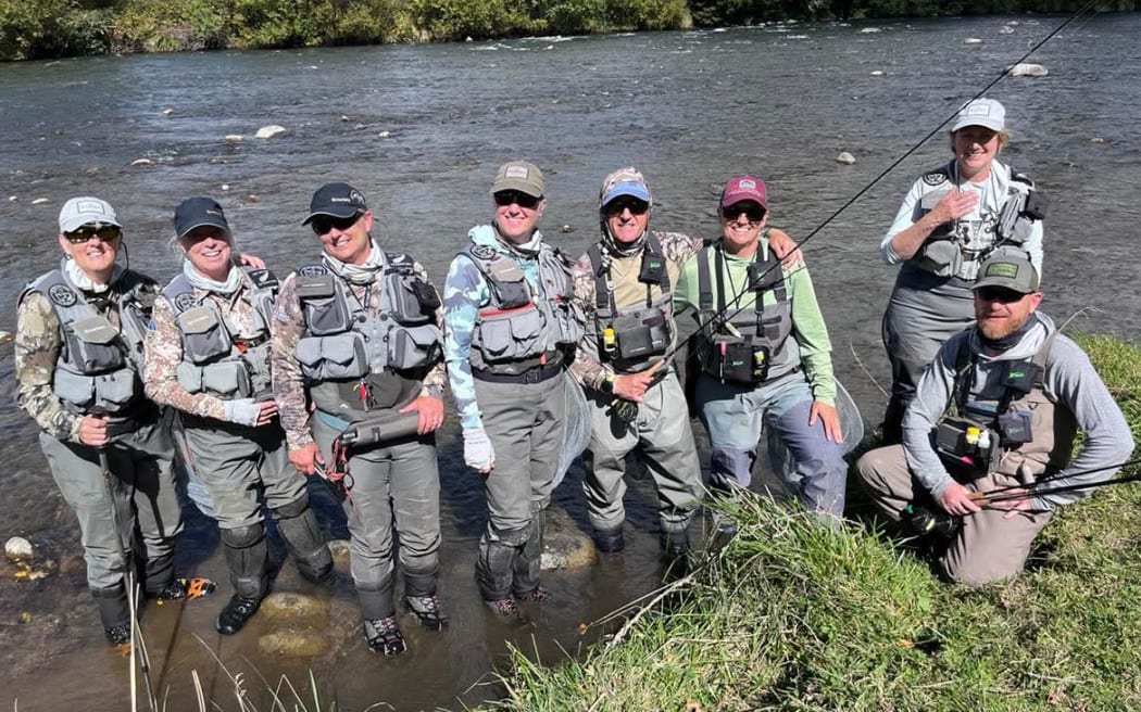 The Fly Ferns are the New Zealand women's fly fishing team. From left Lesley Hosking, Louise Stuart
Rachel McNae (Captain), Suzie Foggo, Pablo Castro Pinos (Visiting Spanish World Champion Coach), Ivy Morrison, Sarah Delany, David Garcia Ferreras (Visiting Spanish World Champion Coach).