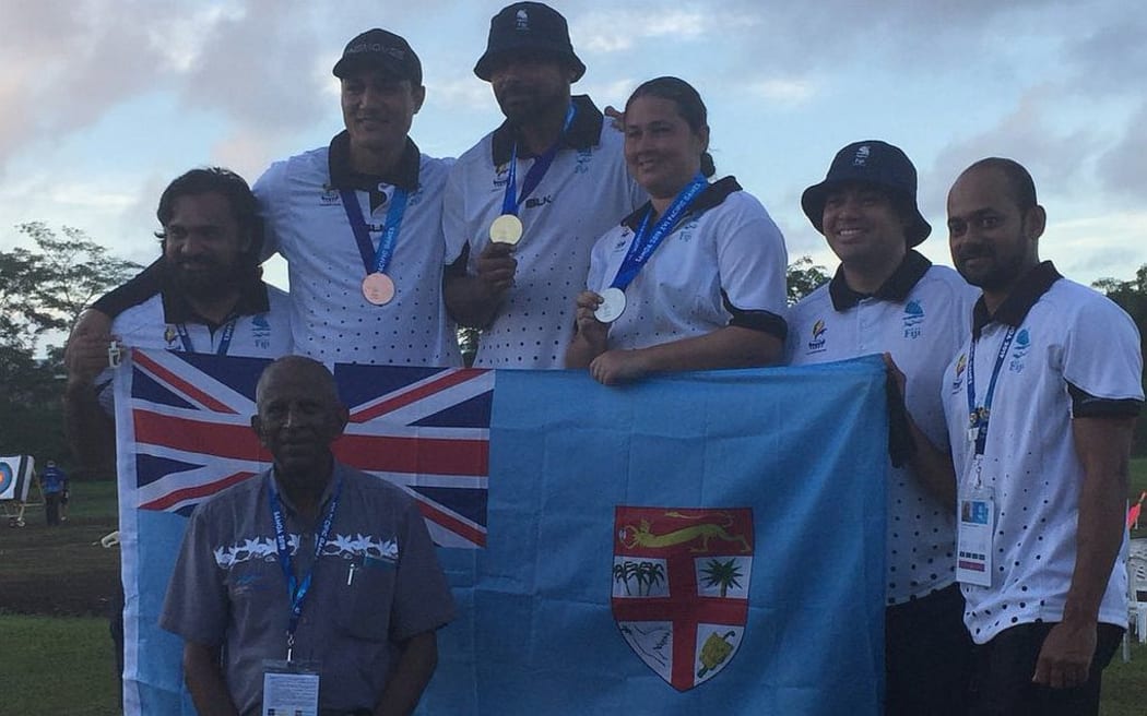 Fiji archers celebrating their medals