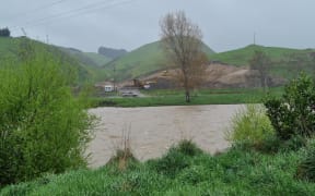 Mataura River, as seen from River Street in Gore, flows swiftly as heavy rain batters the region on 21 September, 2023.