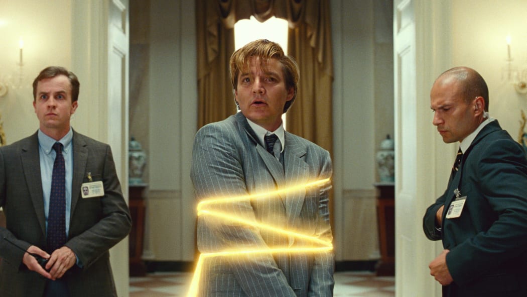Maxwell Lord (Pedro Pascal) captured by the golden lasso of Diana Prince in Wonder Woman 1984