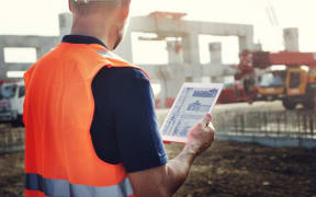 61640355 - construction worker planning contractor developer concept