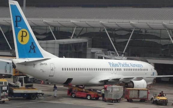 A Palau Pacific Airways plane parked in Hong Kong.