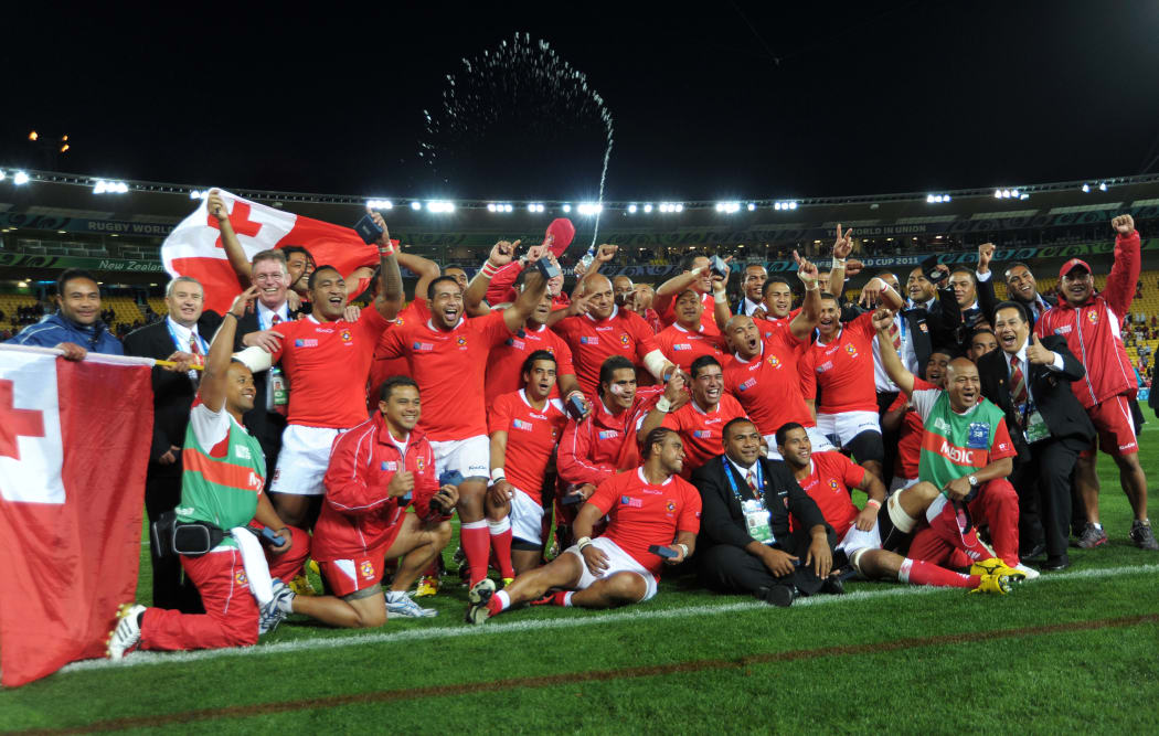 Tonga celebrate their victory over France at the 2011 Rugby World Cup.
