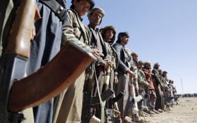SANA'A, YEMEN - JANUARY 14: Houthi followers protest to condemn the U.S.-U.K. during a tribal gathering on January 14, 2024 on the outskirts of Sana'a, Yemen. Houthi followers gathered to protest against the U.S.-U.K. airstrikes on positions in areas under their control. (Photo by Mohammed Hamoud/Getty Images)