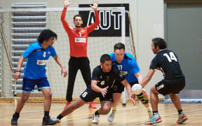 Keir Robertson playing handball for NZ Youth team