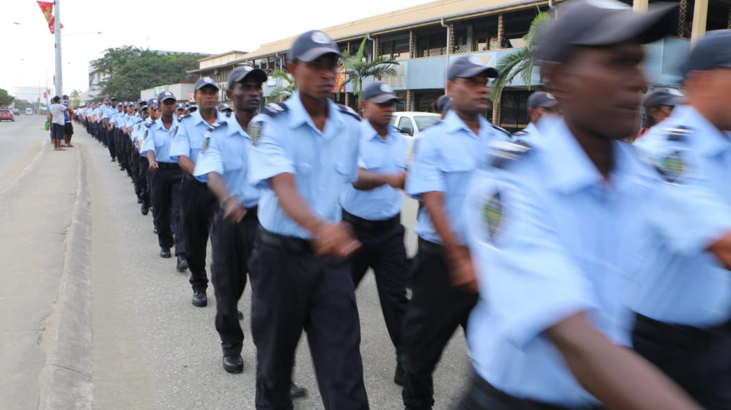 Police march during the Solomon Islands parade.