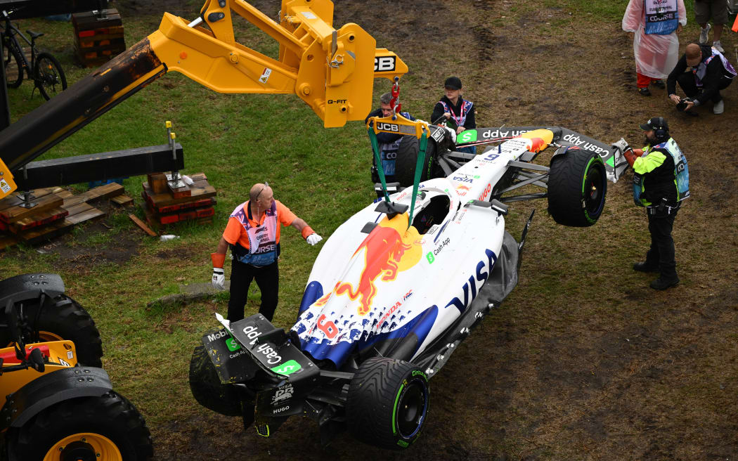 The F1 car of Isack Hadjar of Racing Bulls is removed from the track, Australian Formula One Grand Prix, 2025.