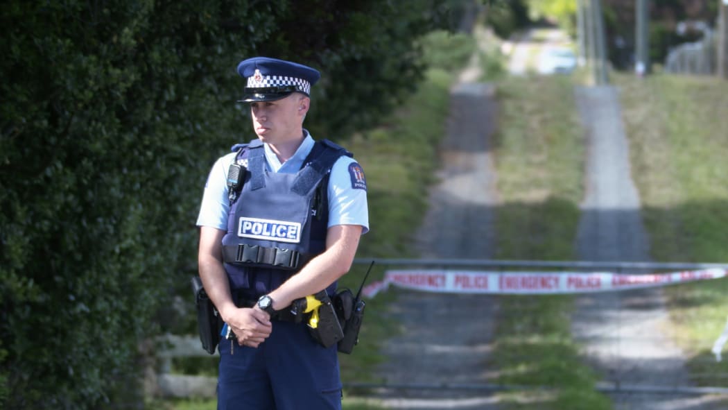 Photographs from outside the cordon at the crime scene in Kingseat.