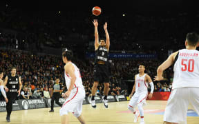 Tall Blacks point guard Shea Ili attempts a jumper against China.