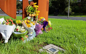 Flowers outside Whangārei Boys' High School in tribute to the student who died on Tuesday on a school trip to Abbey Caves.