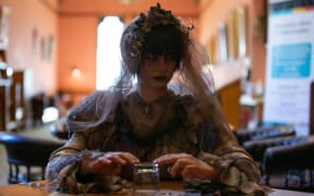 Tour guide dressed as ghost