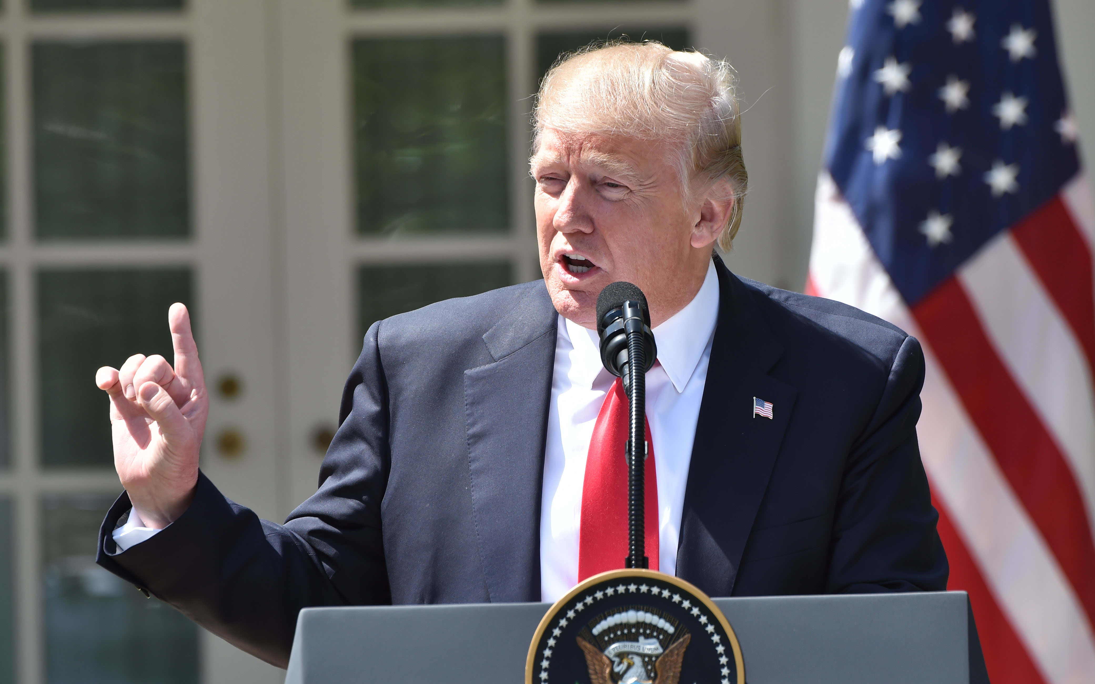 US President Donald Trump has condemned the killing of dozens of civilians in northern Syria in an apparent chemical weapons attack by Syria's air force.