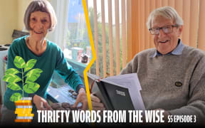Split image of two elderly people in bright indoor settings. On the left, a smiling woman in a teal top places cookies on a cooling rack in a kitchen. On the right, a smiling man in glasses and a grey sweater holds a 2025 planner, seated in front of vertical blinds. A stylised plant growing from stacked coins appears on the left. Text at the bottom reads “Thrifty Words from the Wise – S5 Episode 3.”