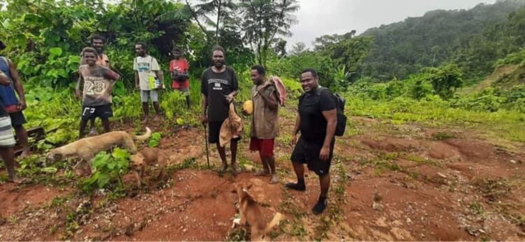 Pastor Israel Sibia and boys in the community up in the hills of central Guadalcanal, Solomon Islands.