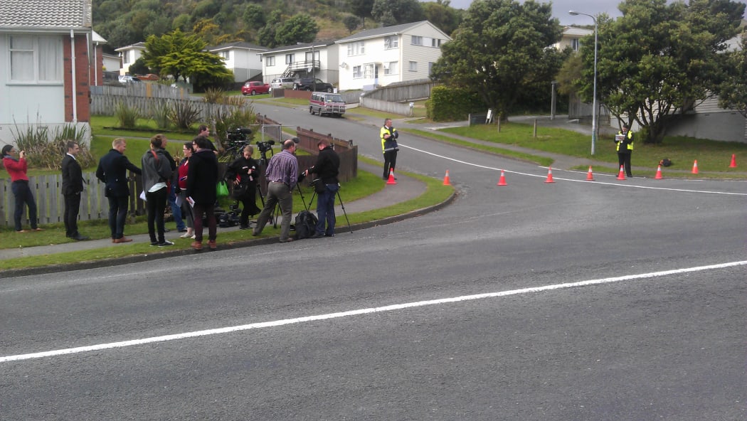 Police speak to media at the scene on Thursday.