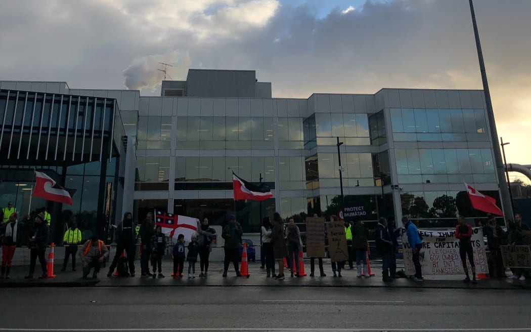 Protesters outside Fletcher Building offices in Penrose, Auckland.