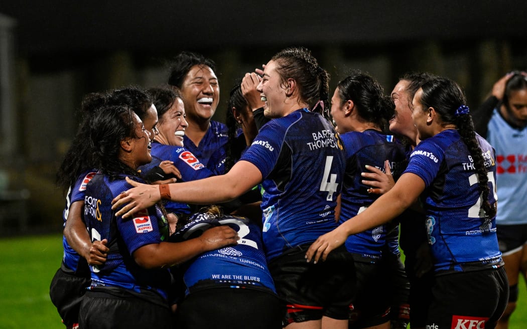 Maiakawanakaulani Roos (captain) of the Blues and Blues Women team celebrate a try from Cheyenne Tuli-Fale of the Blues, Blues Women v NSW Waratahs Women, Inaugural Women's Super Rugby Champions Final.
