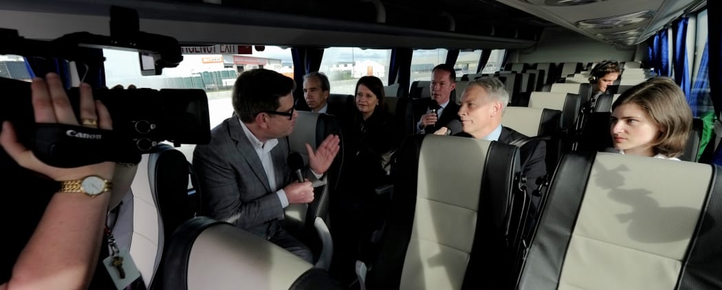 John Campbell spoke to the mayoral candidates on a bus ride through the city