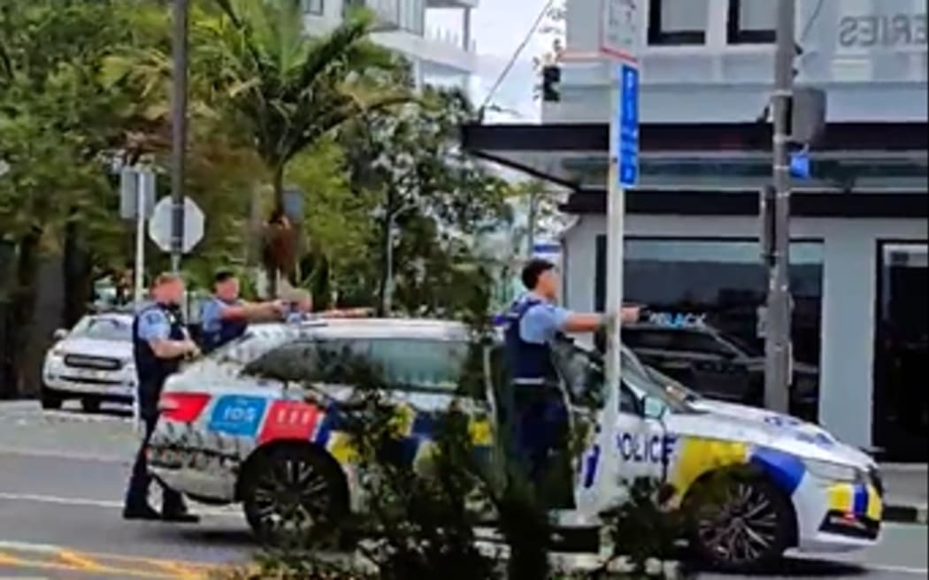 Armed police on Karangahape road.