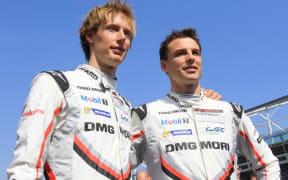 Brendon Hartley (left), and Earl Bamber driving for Porsche.