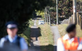 Photographs from outside the cordon at the crime scene in Kingseat.